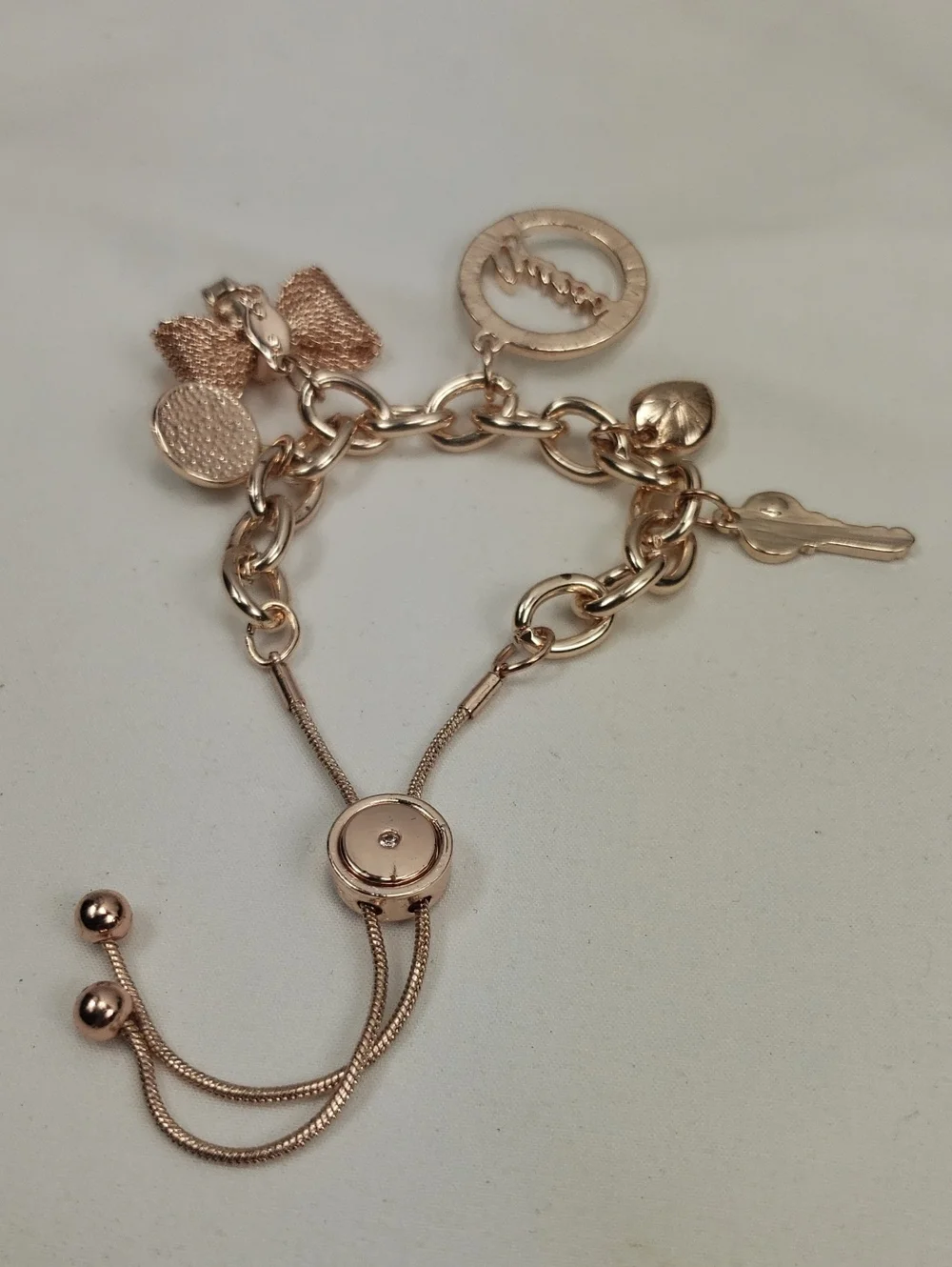 GUESS Rose Gold Charm Slide Bracelet